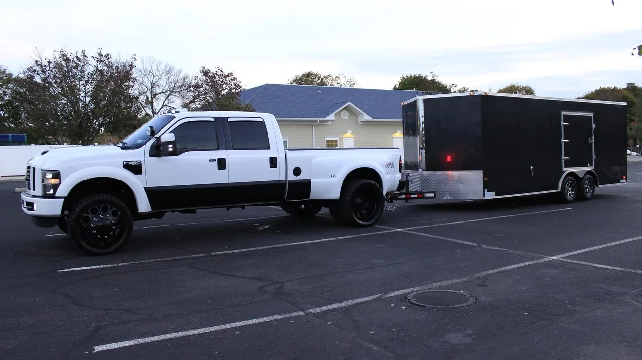 Enclosed carrier hitching system